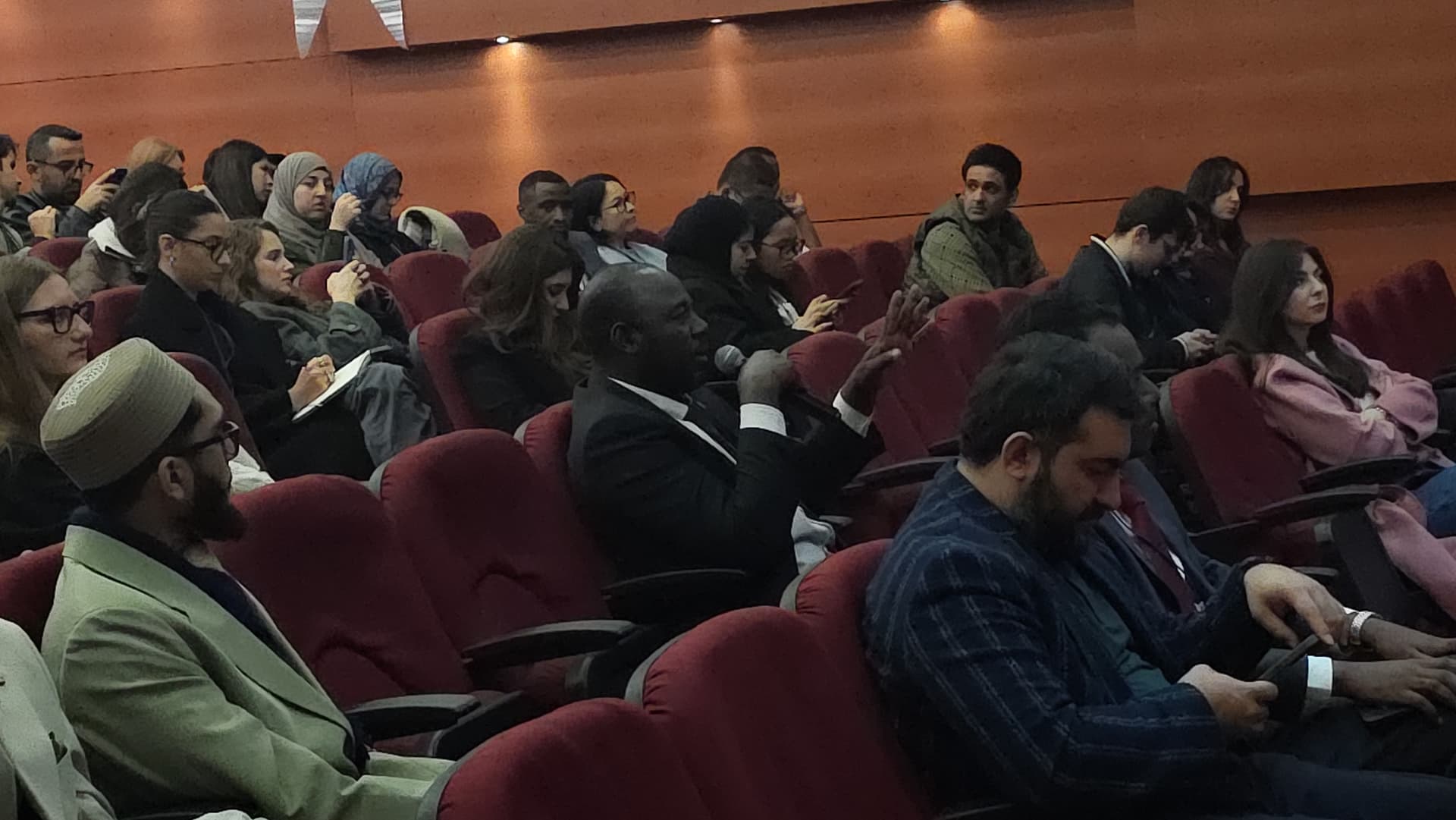 Audience member speaking during an event session